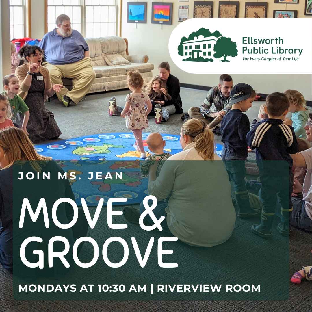 A photo of kids and parents sitting on the ground during a library program